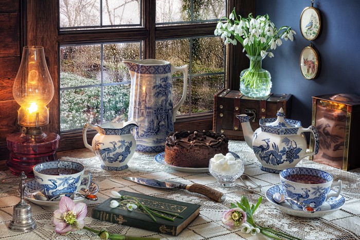 Still-life with cake, tea, and snowdrops