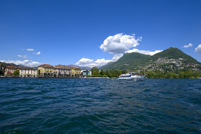 Lake Lugano with Riverboat and Mountains, Switzerland