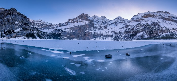 Oeschinensee Lake in Switzerland with Snow-Capped Mountains
