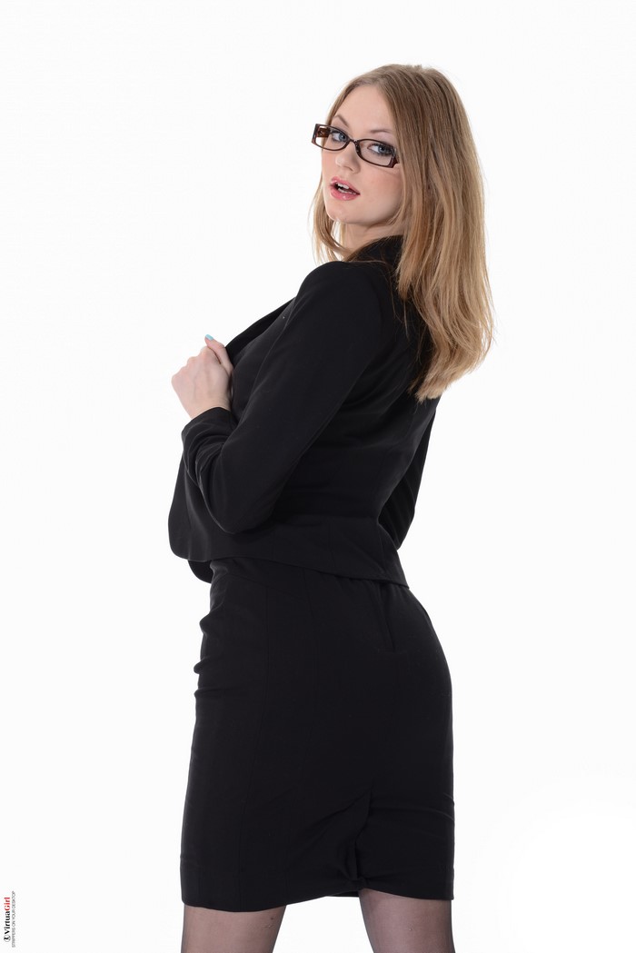 Merry Pie wearing glasses and a black suit