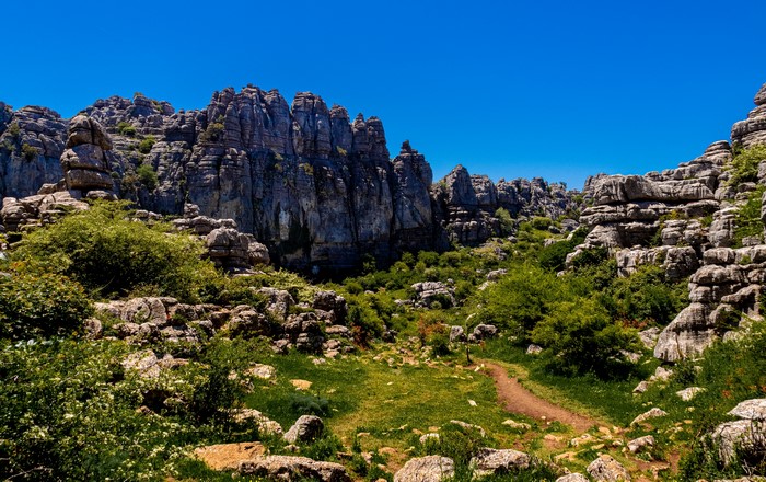 Rocky mountains and green landscape in Malaga, Spain