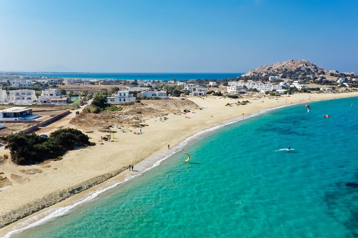 Kitesurfers on a beach in Naxos City, Greece