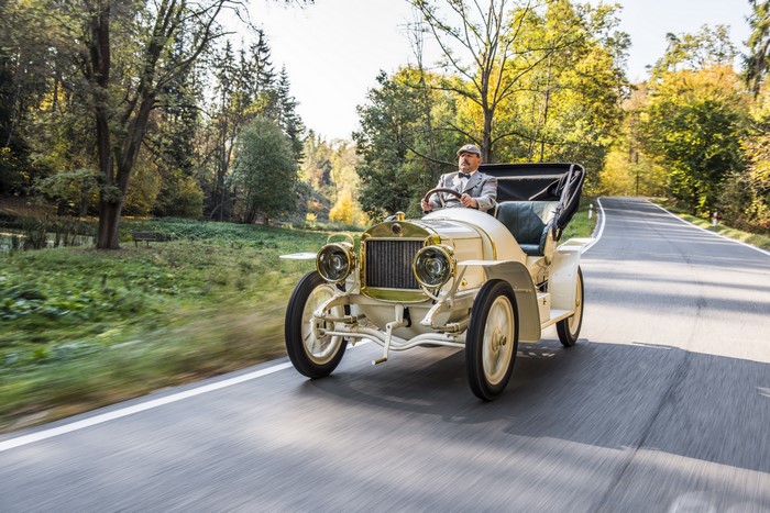 1908 Laurin & Klement Cabriolet driving on a road