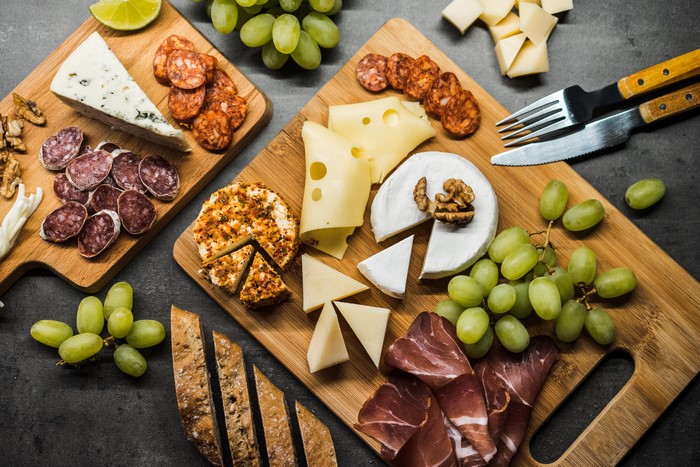 Cheese and Sausage Platter with Grapes and Bread