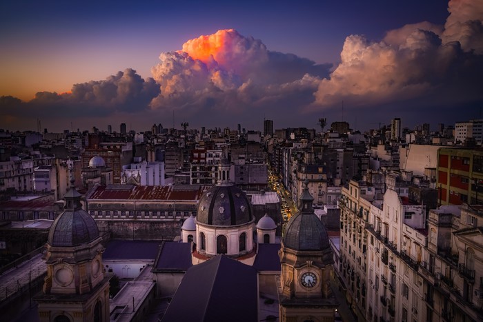 Buenos Aires cityscape at sunset with dramatic clouds