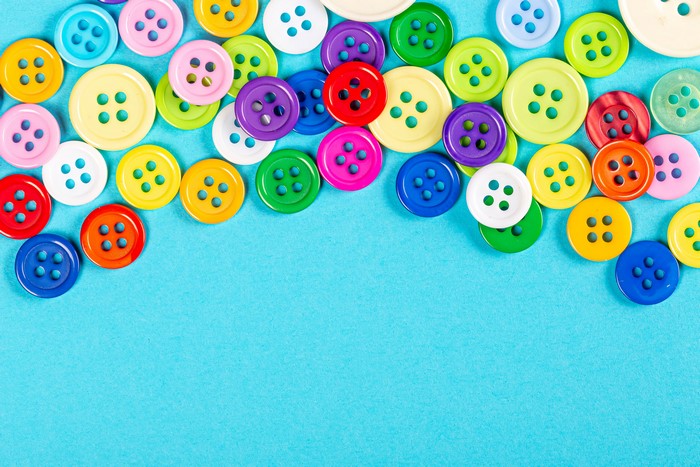 Many colorful buttons on a blue background