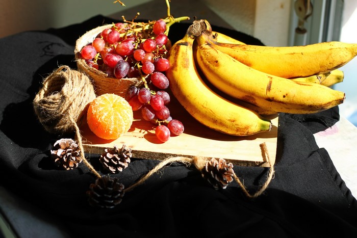 Grapes, Bananas, Mandarine, Pine Cones, and Twine