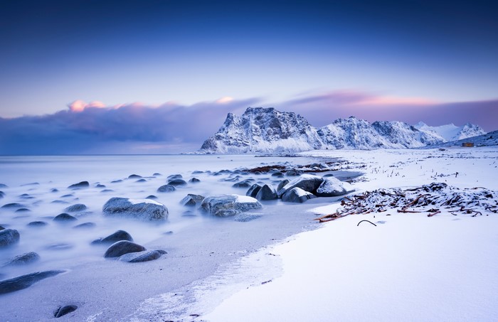 Snowy Mountains and Beach in Lofoten, Norway