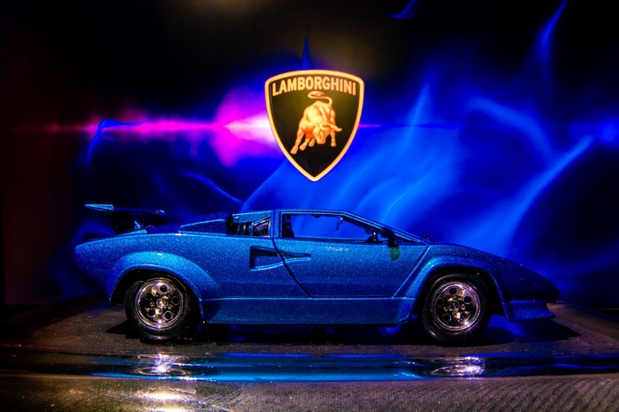 Blue Lamborghini Countach toy car with Lamborghini logo