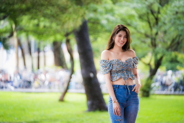 4K Smiling Asian Woman in Casual Jeans and Blouse