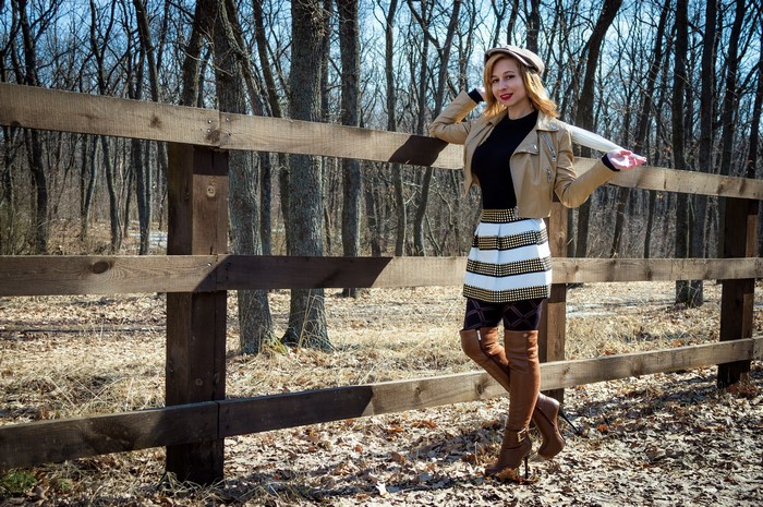 Victoria Borodinova Smiling by Wooden Fence