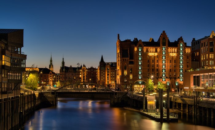 Hamburg Speicherstadt at night with river