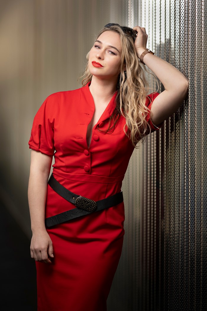 Aleksandra in a red dress with a black belt
