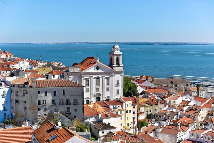 Lisbon, Portugal: Cityscape with Church and River