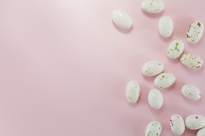 Easter eggs on a pink background