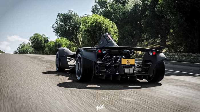 Black BAC Mono car driving on a road