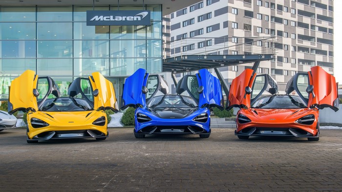 Three McLaren 765LT supercars with scissor doors