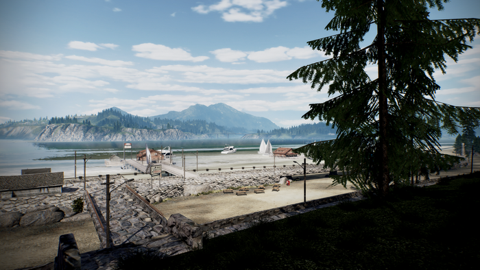 Need for Speed: Hot Pursuit screenshot of a waterfront town