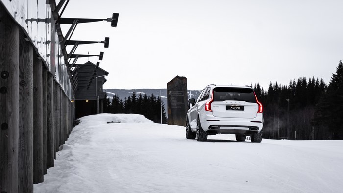 White Volvo XC90 in Snowy Landscape
