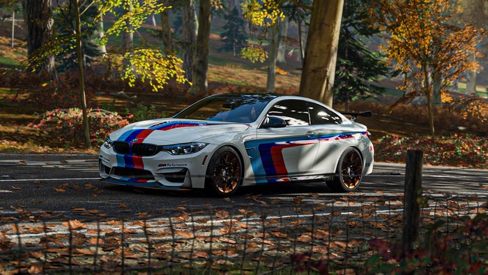 White BMW M4 Coupe with M Performance Livery