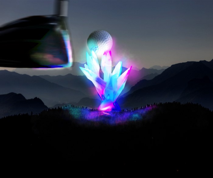 Golf ball on glowing crystals with golf club and mountains