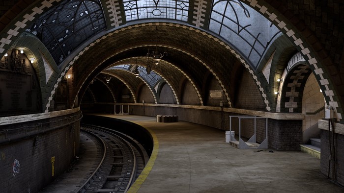 Subway station with arched ceiling and train tracks