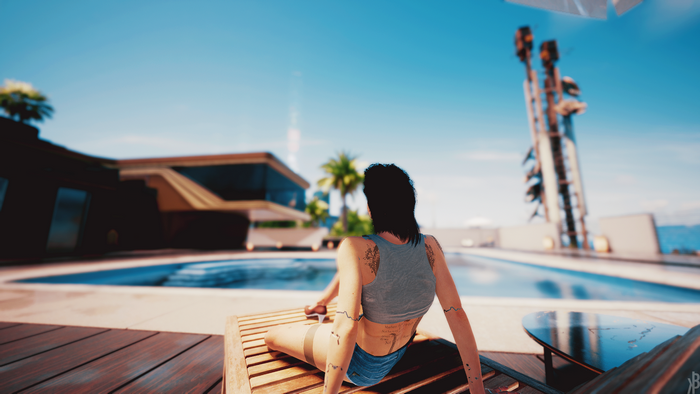 Woman in a tank top and shorts relaxing by a pool in Cyberpunk 2077