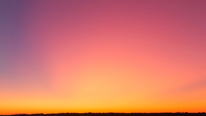 Sunset sky with purple, pink, and orange gradient