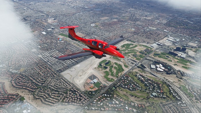 Red Twin-Engine Airplane Flying Over Las Vegas