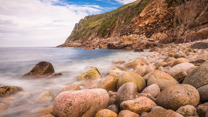 Rocky coastline with long exposure sea