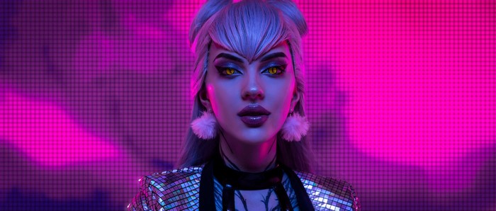 K/DA Ahri cosplay with glowing eyes and disco ball