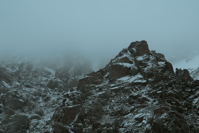 Snowy mountains shrouded in mist