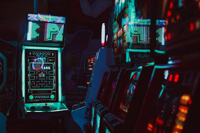 Pac-Man Arcade Game Machines in a Dark Room