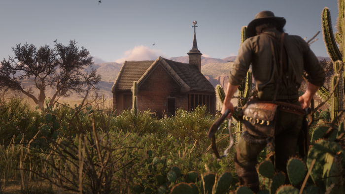 John Marston from Red Dead Redemption 2 in a desert landscape