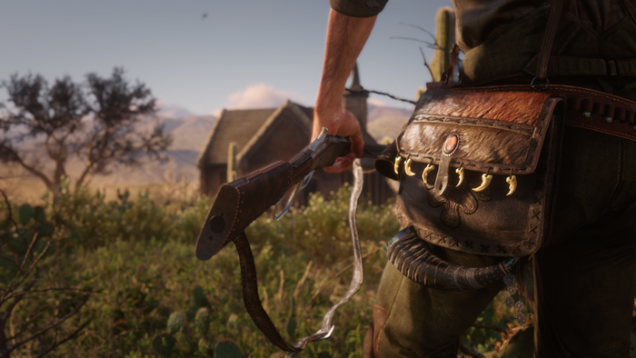 John Marston from Red Dead Redemption 2 holding a weapon
