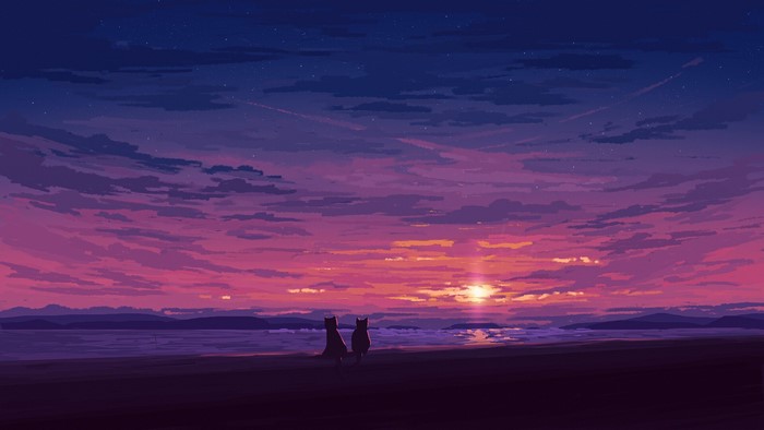 Two cats watching a sunset over the ocean
