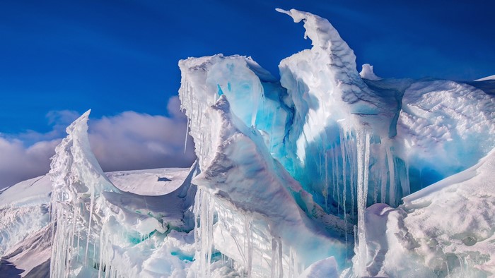 4K Iceberg with Icicles and Blue Sky