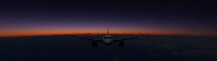 Airplane flying at sunrise over clouds