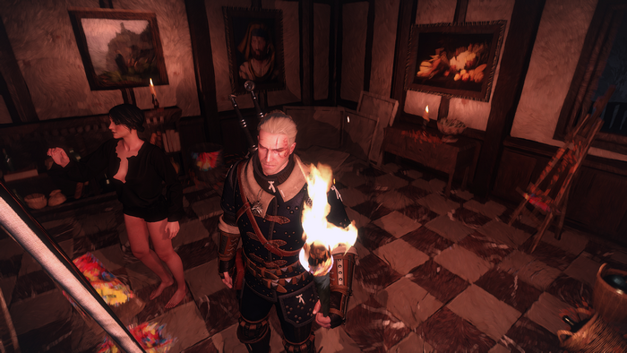 Geralt of Rivia from The Witcher 3 holding a torch