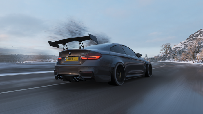 BMW M4 F82 on a snowy road in Forza Horizon 4
