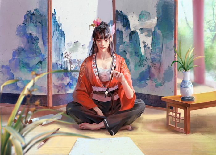 Woman in traditional Japanese attire painting indoors