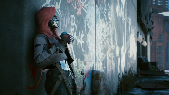 Female character from Cyberpunk 2077 holding a drink