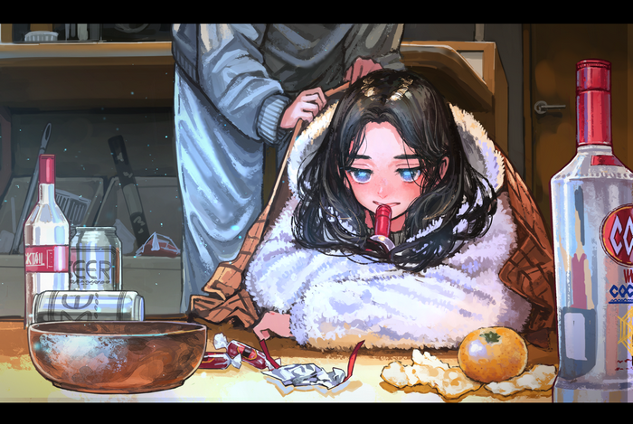 Girl wrapped in blanket with alcohol and snacks