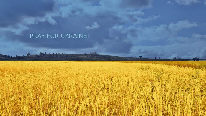 Pray for Ukraine landscape with wheat field