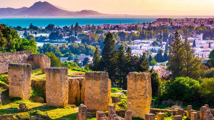 Ancient ruins overlooking a coastal city in Tunisia