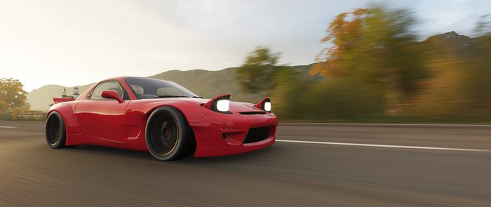 Red Mazda RX-7 FD driving on a road in Forza Horizon 4