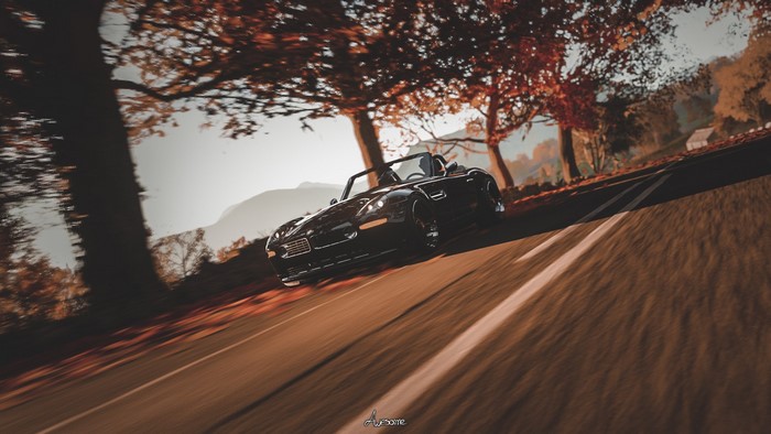 Black BMW Z8 driving on a road in Forza Horizon 4