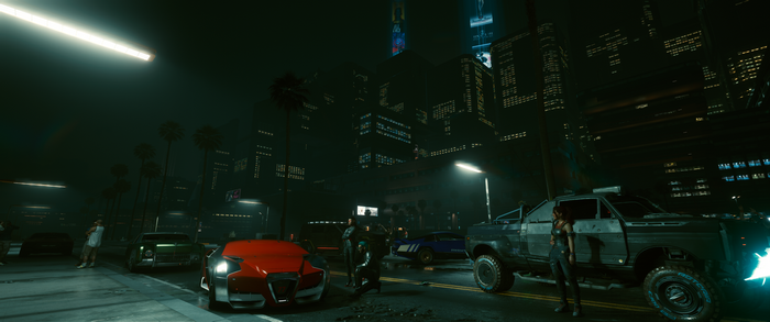 Cyberpunk 2077 screenshot with cars and city skyline