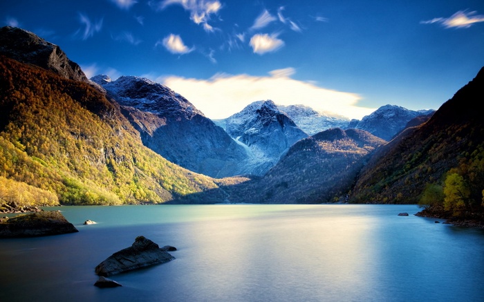 Lake and mountains with autumn foliage
