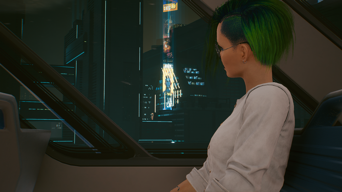 Judy Alvarez from Cyberpunk 2077 looking out a window